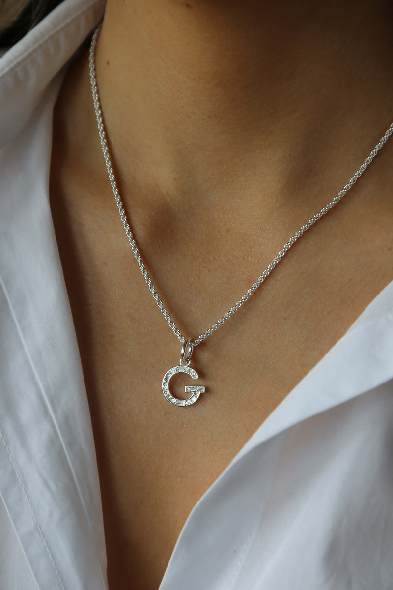 Design silver necklace with letter 